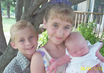 Corey, Sarah and Gracelyn...just almost 2 weeks after Gracelyn was born!